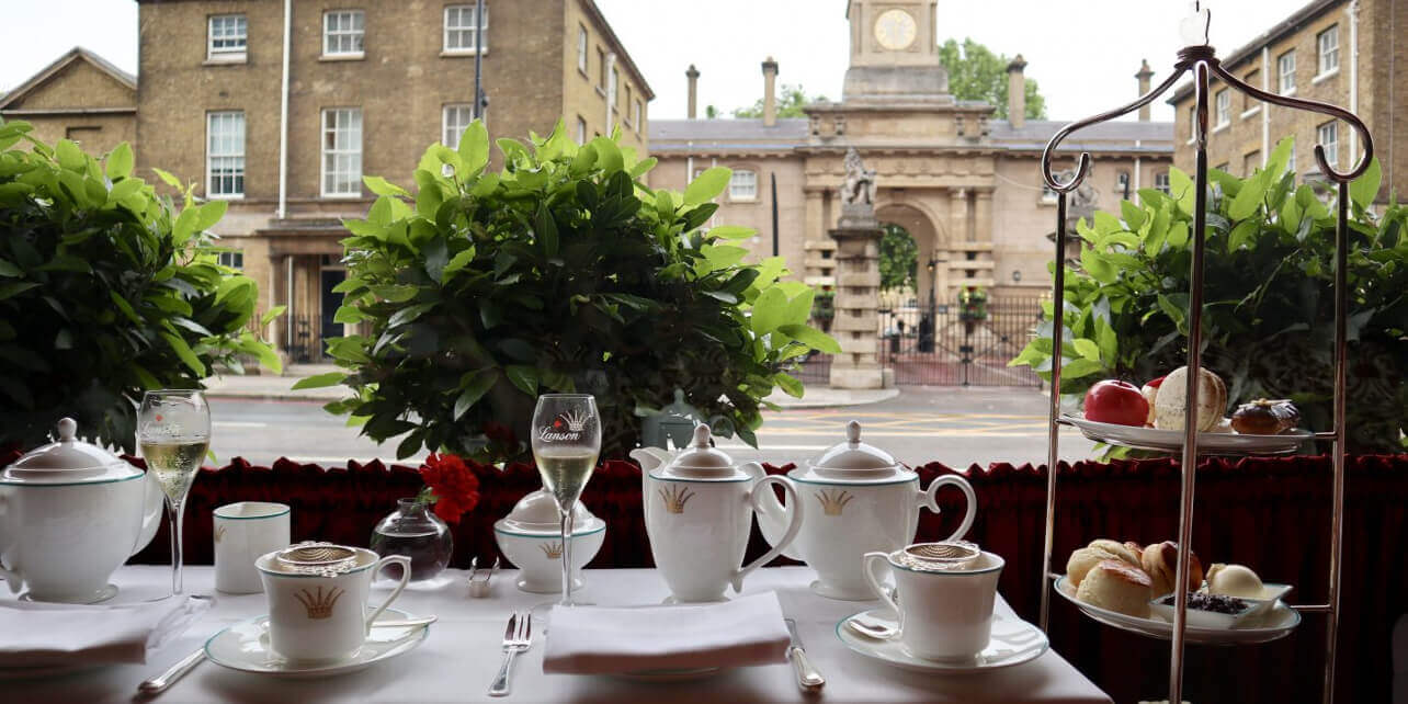 Afternoon Tea stand with cakes, pastries, sandwiches and scones